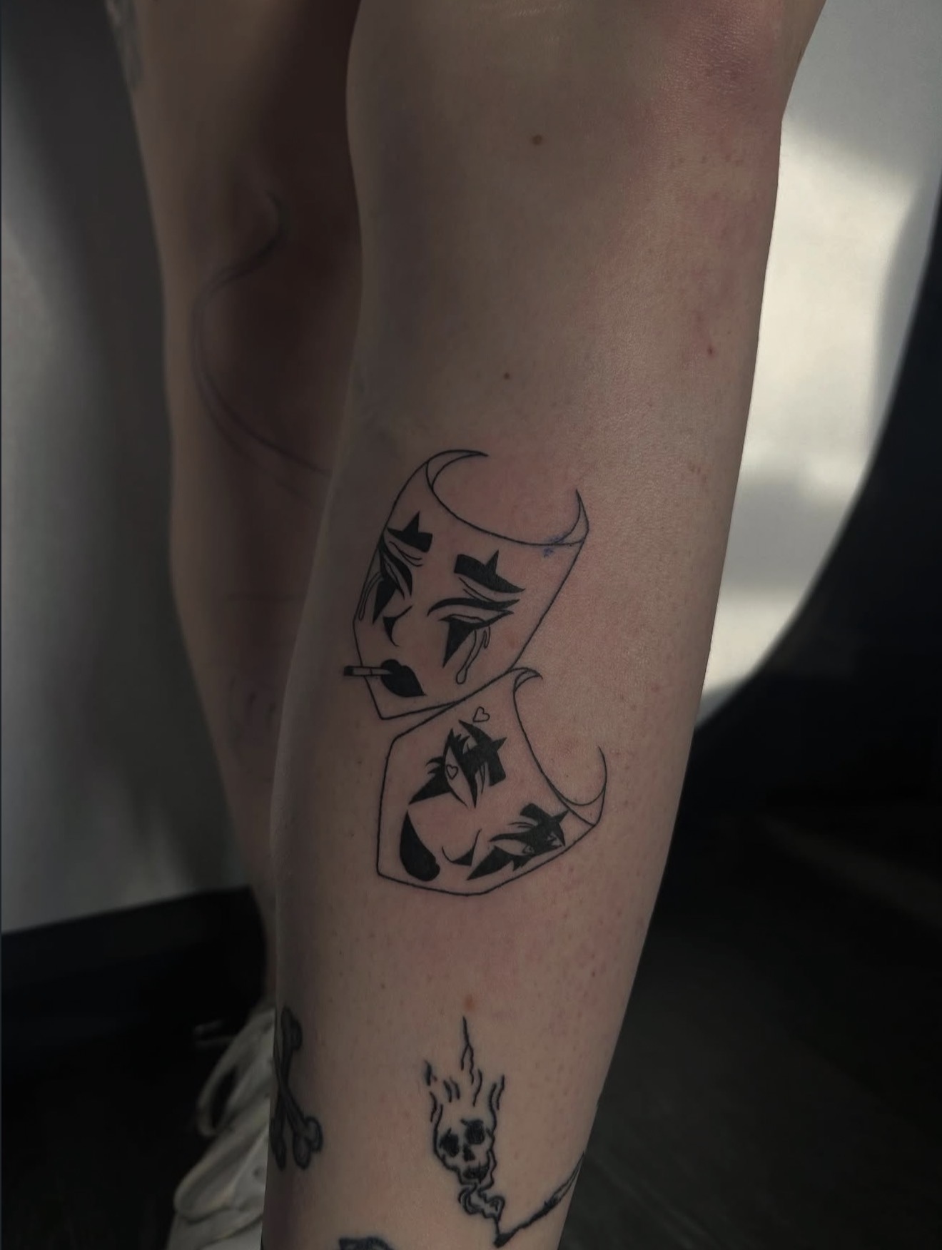 Theatre masks, lower leg